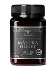 A jar of BeeNZ Premium New Zealand Manuka Honey UMF 15+ with a black label on a white background.