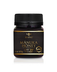 A jar of BeeNZ Premium New Zealand Mānuka Honey UMF 20+ in a 125g size, with a black and gold label.