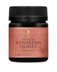 Jar of BeeNZ premium Rewarewa Honey . Rich caramel flavour best for baking.