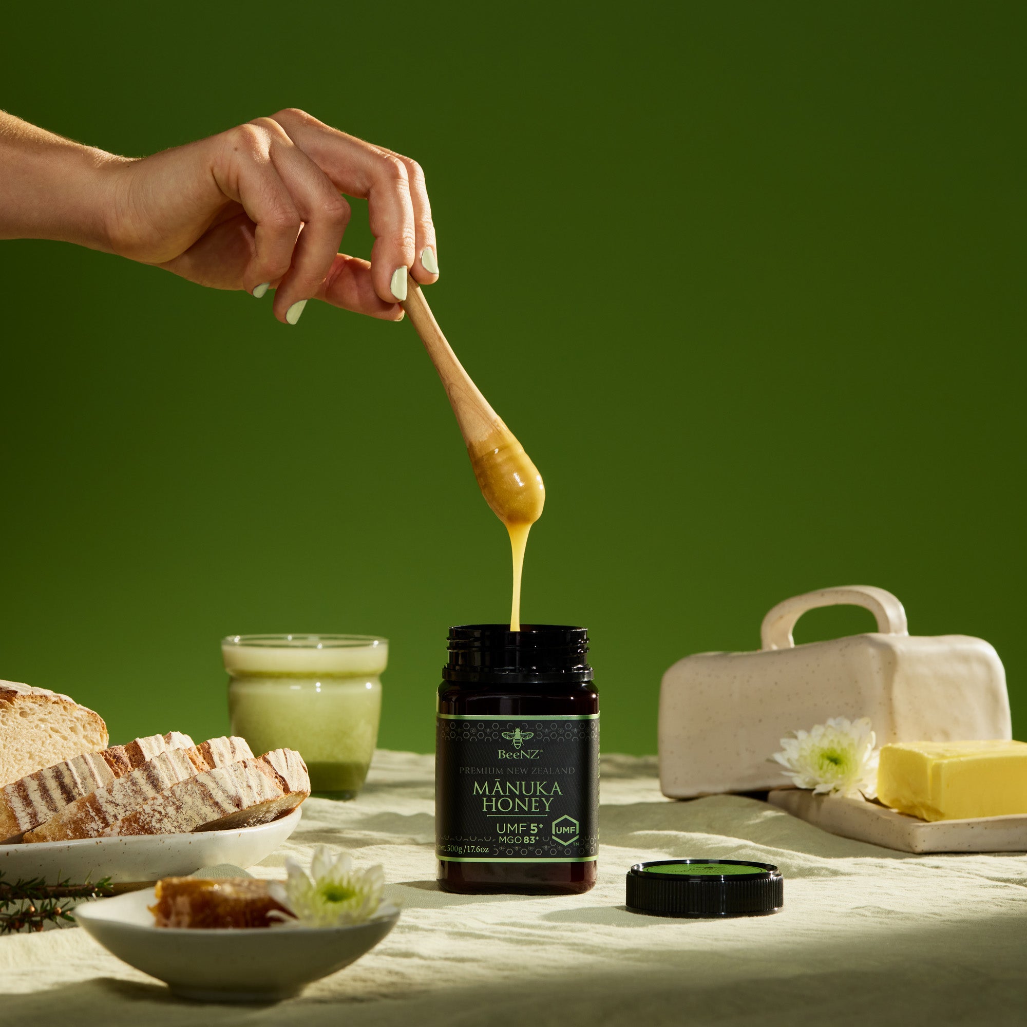 Dripping honey to make honey toast on breakfast table 