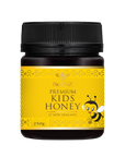 Jar of premium kids honey with a black lid and a bee on the front of the label indicating it is for kids.